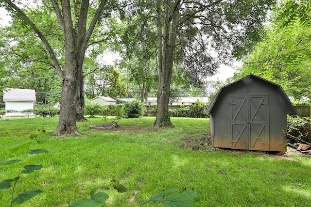 3512 S Ferguson Ave, Springfield, MO 65807 - view of grassy yard with a storage shed