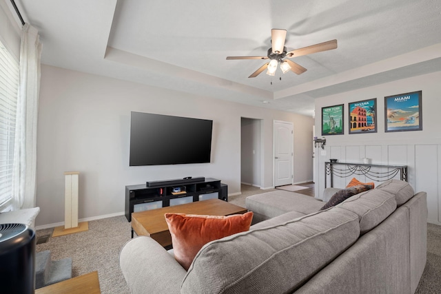 460 Hudson Ave, Republic, MO 65738 - living area featuring carpet flooring, a ceiling fan, and a tray ceiling