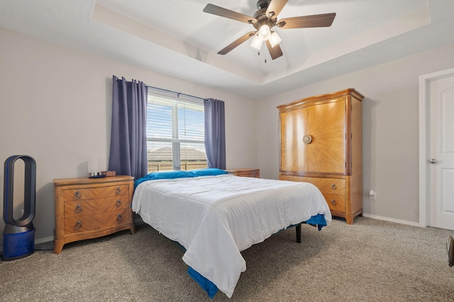 460 Hudson Ave, Republic, MO 65738 - bedroom with a tray ceiling, light carpet, and a ceiling fan