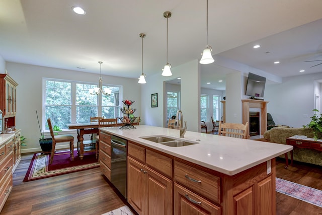 21791 Mill Creek Dr, Shell Knob, MO 65747 - kitchen with a fireplace, stainless steel dishwasher, dark wood-style floors, light countertops, and recessed lighting