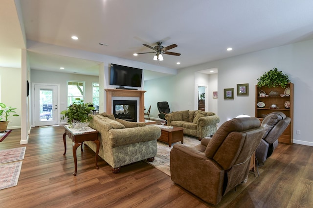 21791 Mill Creek Dr, Shell Knob, MO 65747 - living area featuring a glass covered fireplace, dark wood-type flooring, recessed lighting, and a ceiling fan