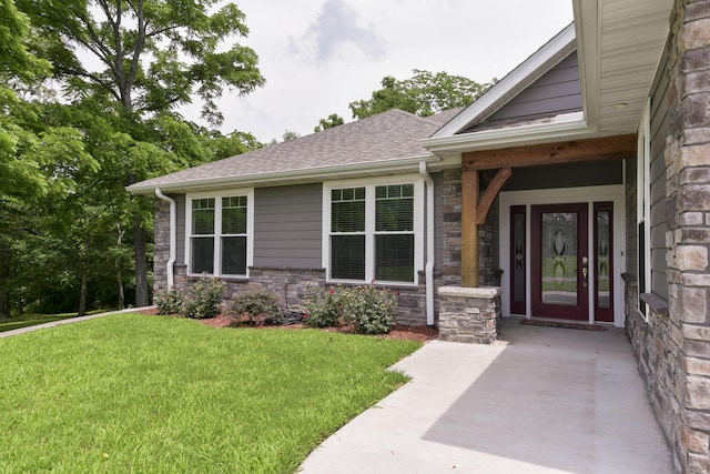 21791 Mill Creek Dr, Shell Knob, MO 65747 - doorway to property featuring stone siding, a yard, and a shingled roof