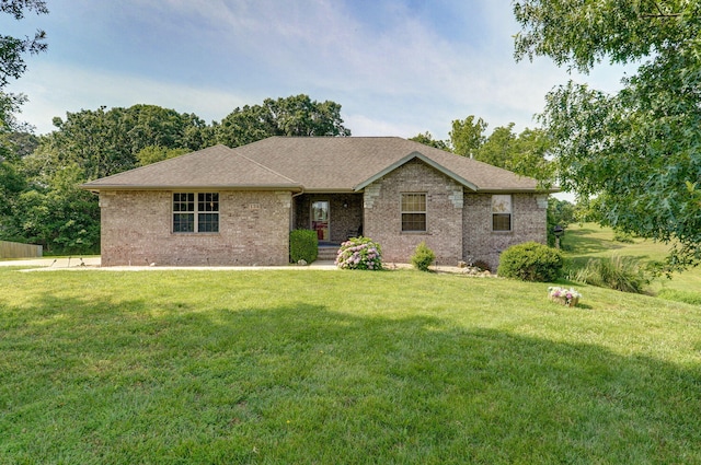 136 Cedar Dale Ln, Ozark, MO 65721 - ranch-style house with a front lawn, brick siding, and roof with shingles