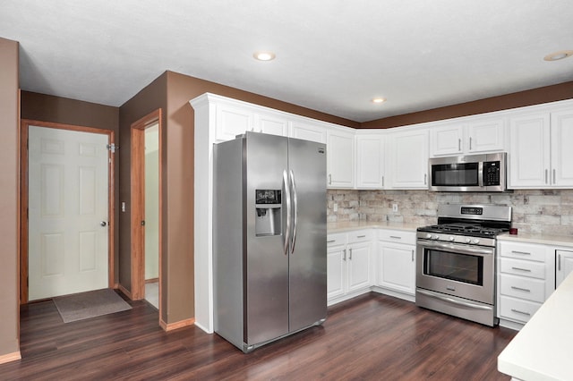 136 Cedar Dale Ln, Ozark, MO 65721 - kitchen featuring stainless steel appliances, dark wood-style flooring, light countertops, backsplash, and recessed lighting