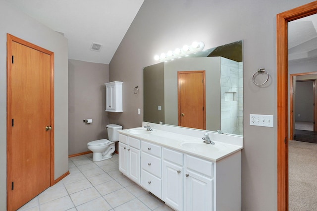 136 Cedar Dale Ln, Ozark, MO 65721 - bathroom featuring double vanity, lofted ceiling, and tile patterned floors