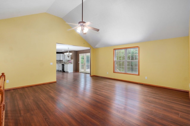 136 Cedar Dale Ln, Ozark, MO 65721 - unfurnished living room with ceiling fan, dark wood-type flooring, a chandelier, and high vaulted ceiling