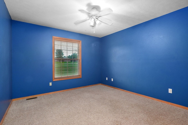 136 Cedar Dale Ln, Ozark, MO 65721 - carpeted spare room featuring a ceiling fan and baseboards