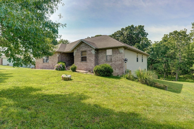 136 Cedar Dale Ln, Ozark, MO 65721 - view of front of home with a front lawn and brick siding