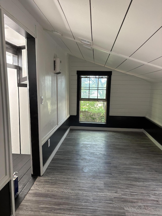 189 Walnut St, Sparta, MO 65753 - unfurnished room with dark wood-type flooring and wooden walls