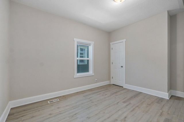 619 N Nettleton Ave, Springfield, MO 65802 - empty room featuring wood finished floors and baseboards