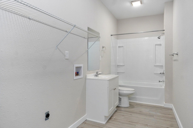619 N Nettleton Ave, Springfield, MO 65802 - full bathroom featuring vanity, wood finished floors, and bathing tub / shower combination