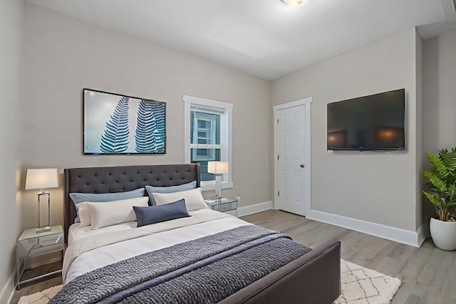 619 N Nettleton Ave, Springfield, MO 65802 - bedroom featuring baseboards and light wood-style flooring