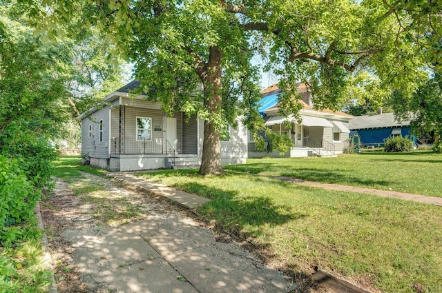 619 N Nettleton Ave, Springfield, MO 65802 - view of front of home featuring covered porch and a front yard