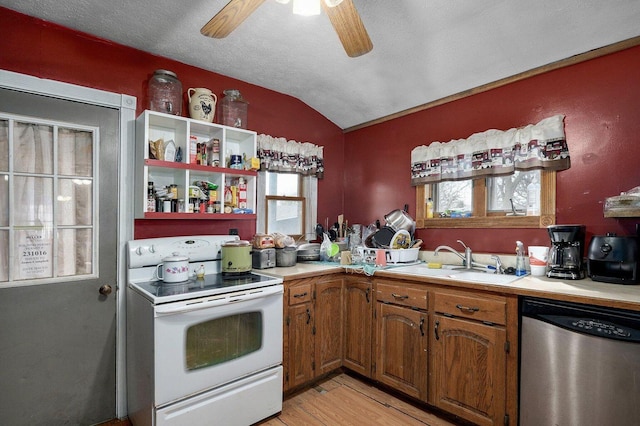 106 S Gilmore St, Miller, MO 65707 - kitchen featuring electric range, dishwasher, light countertops, ceiling fan, and lofted ceiling