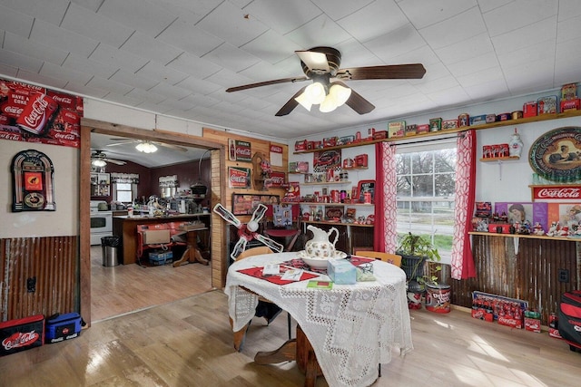 106 S Gilmore St, Miller, MO 65707 - dining room with a ceiling fan and wood finished floors