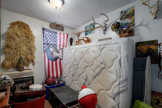 106 S Gilmore St, Miller, MO 65707 - bedroom featuring a textured ceiling