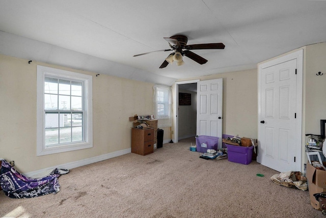 106 S Gilmore St, Miller, MO 65707 - game room featuring a ceiling fan, carpet floors, and plenty of natural light