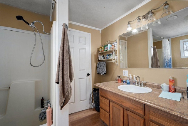 106 S Gilmore St, Miller, MO 65707 - bathroom featuring vanity, curtained shower, wood finished floors, a textured ceiling, and crown molding