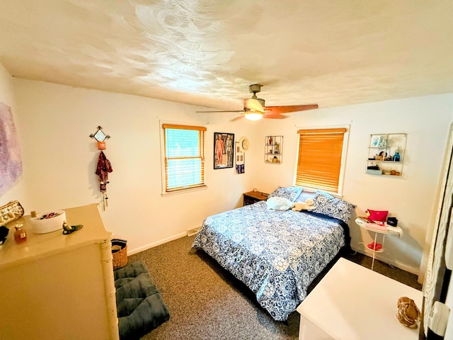 6424 W Farm Rd Unit 140, Springfield, MO 65802 - bedroom with carpet and ceiling fan