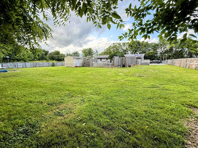 6424 W Farm Rd Unit 140, Springfield, MO 65802 - fenced backyard featuring a shed