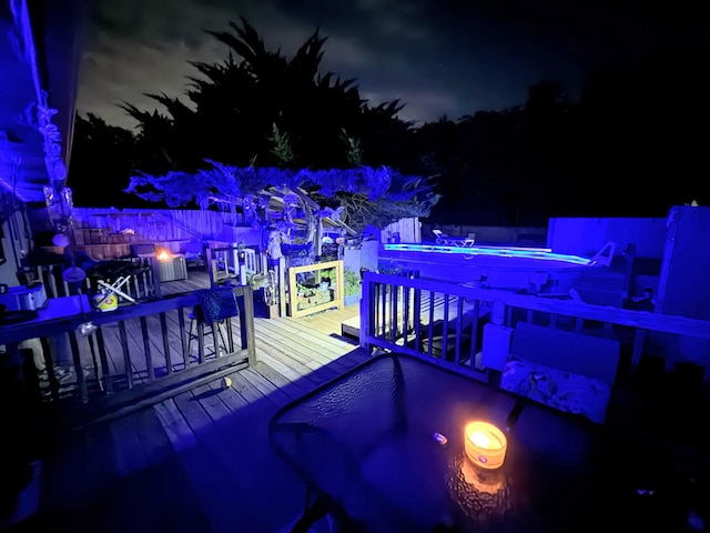 6424 W Farm Rd Unit 140, Springfield, MO 65802 - view of deck at night