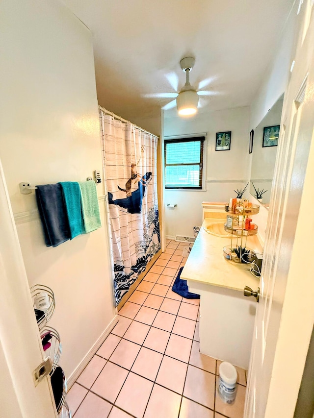6424 W Farm Rd Unit 140, Springfield, MO 65802 - full bathroom with tile patterned flooring, ceiling fan, vanity, and a shower with curtain