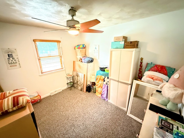 6424 W Farm Rd Unit 140, Springfield, MO 65802 - carpeted bedroom with a ceiling fan and baseboards