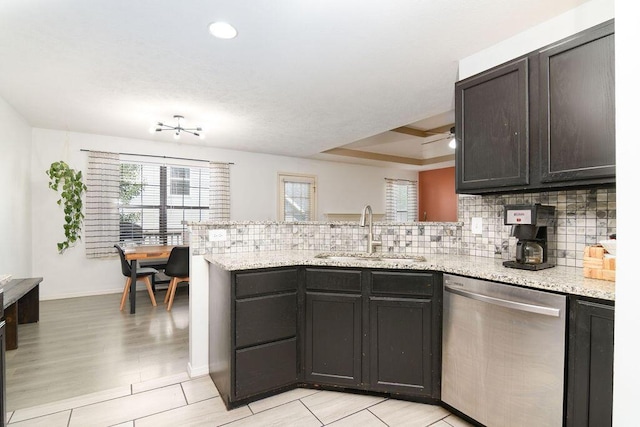 828 S Chinkapin Ave, Nixa, MO 65714 - kitchen with dishwasher, a peninsula, plenty of natural light, decorative backsplash, and recessed lighting