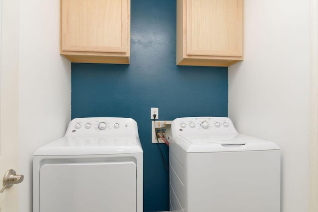 828 S Chinkapin Ave, Nixa, MO 65714 - laundry area with cabinet space and washer and dryer