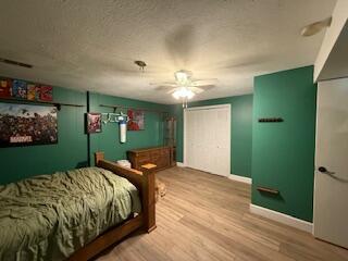 5125 S Walnut Hill Rd, Springfield, MO 65810 - bedroom featuring wood finished floors and a ceiling fan