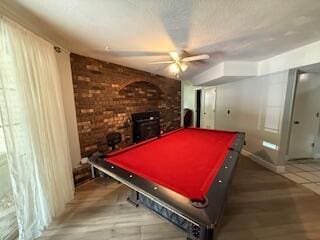 5125 S Walnut Hill Rd, Springfield, MO 65810 - recreation room featuring ceiling fan, pool table, and a wood stove