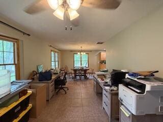 5125 S Walnut Hill Rd, Springfield, MO 65810 - home office with tile patterned floors and a ceiling fan