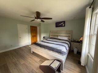 5125 S Walnut Hill Rd, Springfield, MO 65810 - bedroom featuring wood finished floors and ceiling fan