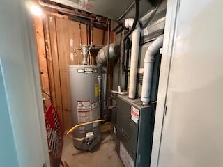 5125 S Walnut Hill Rd, Springfield, MO 65810 - utility room featuring gas water heater