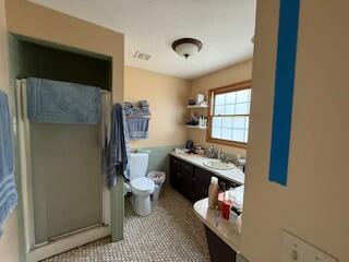5125 S Walnut Hill Rd, Springfield, MO 65810 - bathroom with a stall shower and vanity