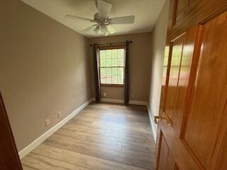 5125 S Walnut Hill Rd, Springfield, MO 65810 - spare room featuring light wood-style flooring and a ceiling fan