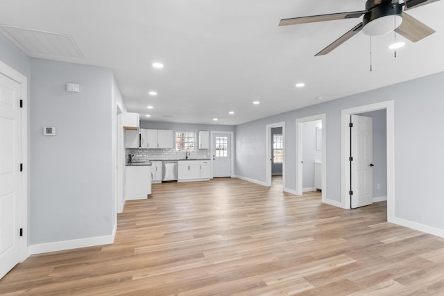 305 Crescent St, Aurora, MO 65605 - unfurnished living room with recessed lighting, light wood finished floors, and a ceiling fan
