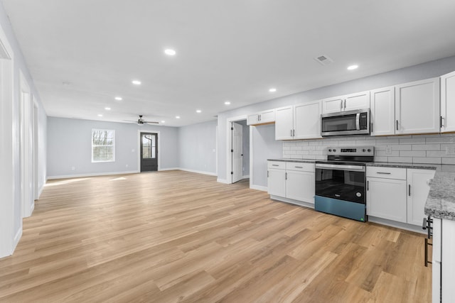305 Crescent St, Aurora, MO 65605 - kitchen featuring stainless steel appliances, decorative backsplash, a ceiling fan, recessed lighting, and light wood-type flooring