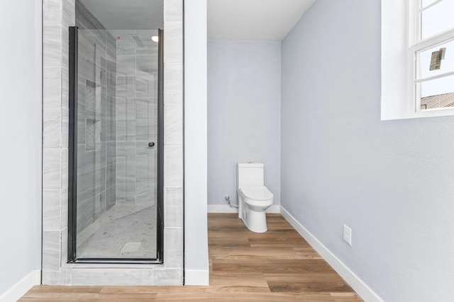 305 Crescent St, Aurora, MO 65605 - full bath featuring a stall shower and wood finished floors