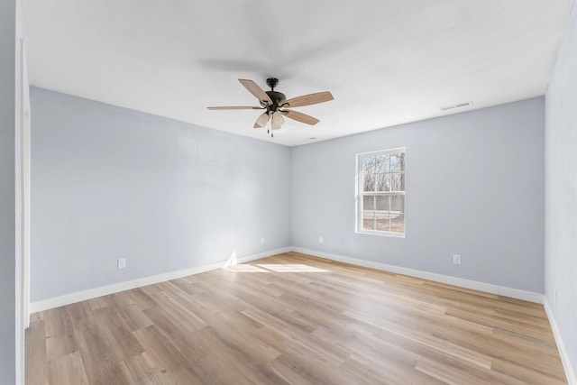 305 Crescent St, Aurora, MO 65605 - spare room with a ceiling fan and light wood finished floors