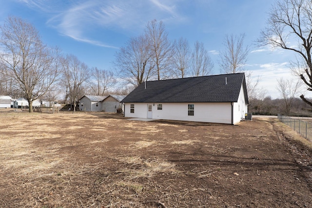 305 Crescent St, Aurora, MO 65605 - back of house featuring a shingled roof