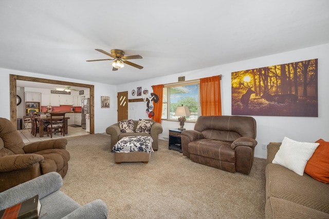 212 N School St, Goodman, MO 64843 - carpeted living area with a ceiling fan