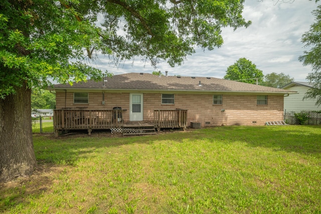 212 N School St, Goodman, MO 64843 - back of house with crawl space, a yard, a deck, and a shingled roof