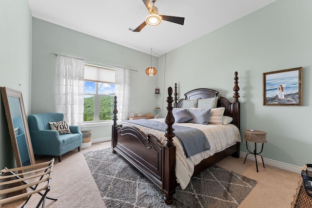 215 Split Rock Dr, Hollister, MO 65672 - carpeted bedroom with baseboards and ceiling fan