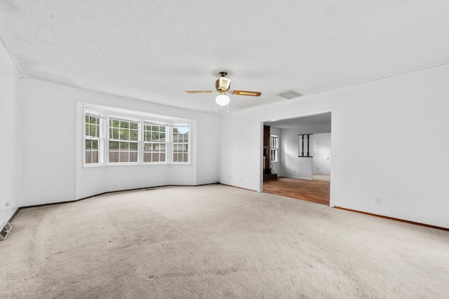 1541 E Crestview St, Springfield, MO 65804 - carpeted spare room featuring ceiling fan and baseboards