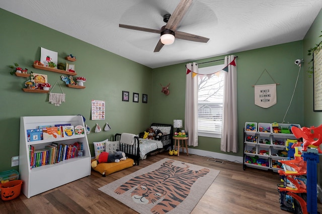 2060 Buckhorn Rd, Ozark, MO 65721 - bedroom featuring wood finished floors and ceiling fan