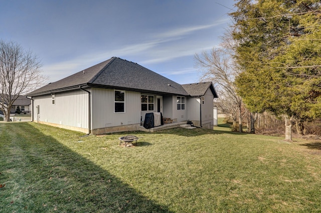 2060 Buckhorn Rd, Ozark, MO 65721 - rear view of house featuring an outdoor fire pit, roof with shingles, and a lawn