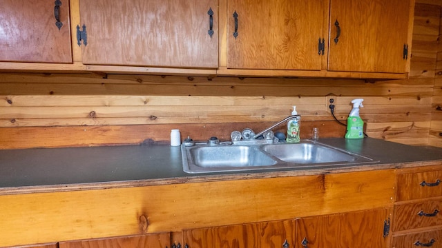 1160 Bethel Ave, Mammoth Spring, AR 72554 - detailed view of brown cabinets and wood walls