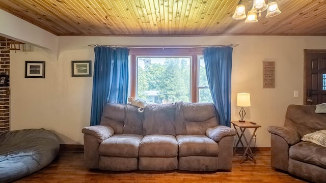 1160 Bethel Ave, Mammoth Spring, AR 72554 - living area featuring wood finished floors, wood ceiling, and a chandelier