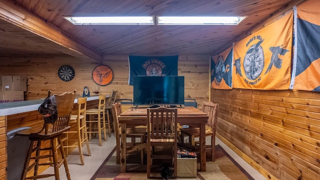 1160 Bethel Ave, Mammoth Spring, AR 72554 - dining room with wood walls, wooden ceiling, and a skylight